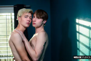 Boys in bed having sex