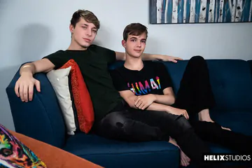 Boys on a blue sofa fucking