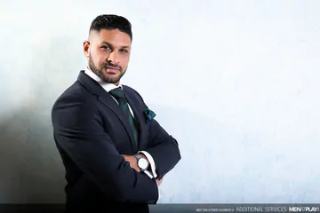Men in suits having bareback sex