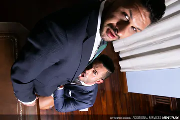 Men in suits having bareback sex