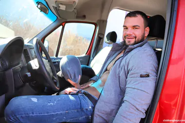 Man in a car gets head