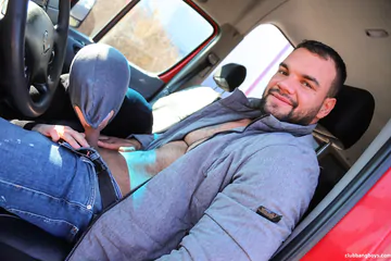 Man in a car gets head