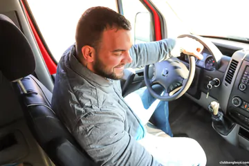 Man in a car gets head