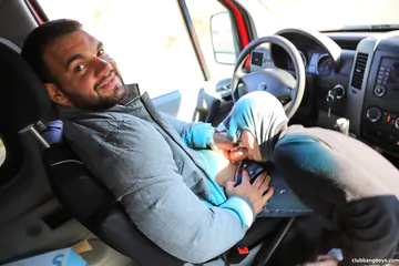 Man in a car gets head