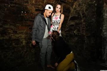 Two guys and a girl in the stairs