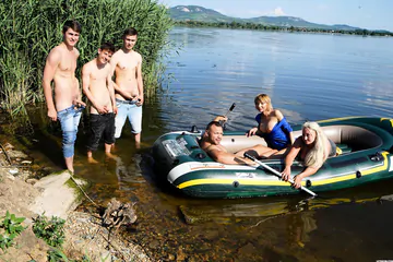 People having group sex outdoors