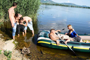 People having group sex outdoors