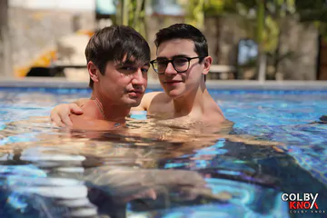 Guys in a pool having sex