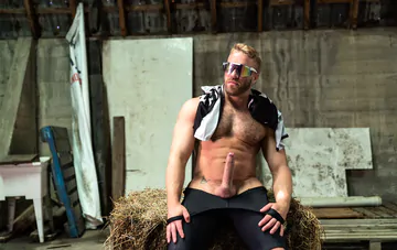 Two men fucking in a barn