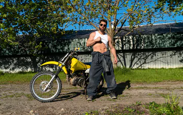 Two men fucking in a barn