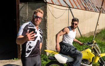 Two men fucking in a barn