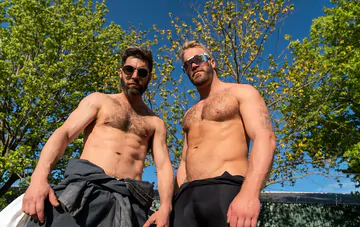 Two men fucking in a barn