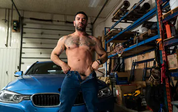 Sexy boy gets fucked in a garage
