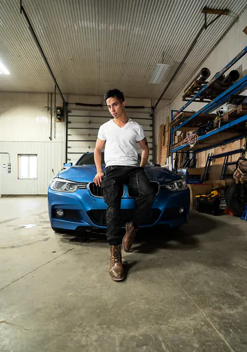 Sexy boy gets fucked in a garage