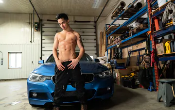 Sexy boy gets fucked in a garage
