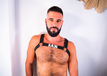 Hairy bearded man masturbating