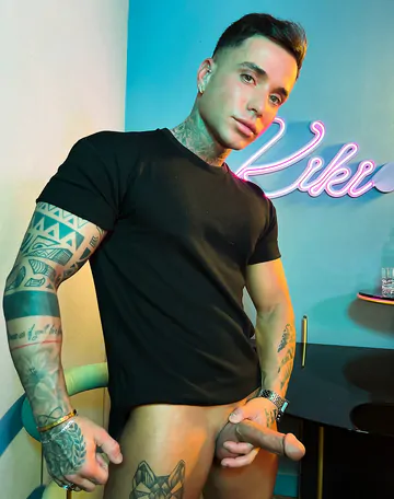 Tattooed guy with a shaved cock