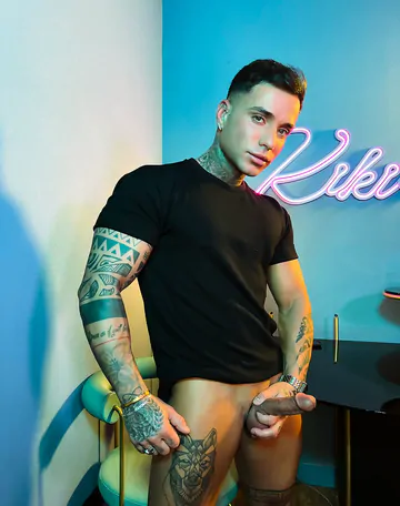 Tattooed guy with a shaved cock
