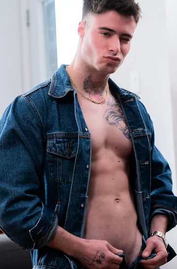 Tattooed stud fucking his buddy