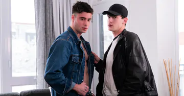 Tattooed stud fucking his buddy