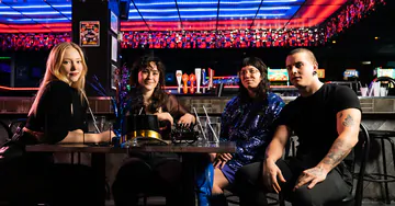 Guys at a nightclub fucking