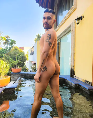 Tattooed man fucking ass bareback