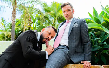 Guys in suits fucking in a pool