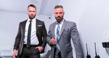 Men in suits having gay sex