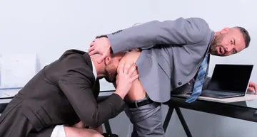 Men in suits having gay sex
