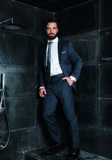 Guys in suits taking a shower