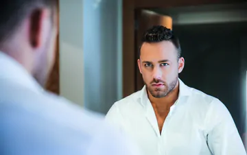 Guys in suits taking a shower