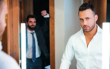 Guys in suits taking a shower