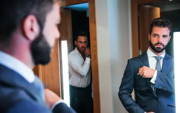 Guys in suits taking a shower