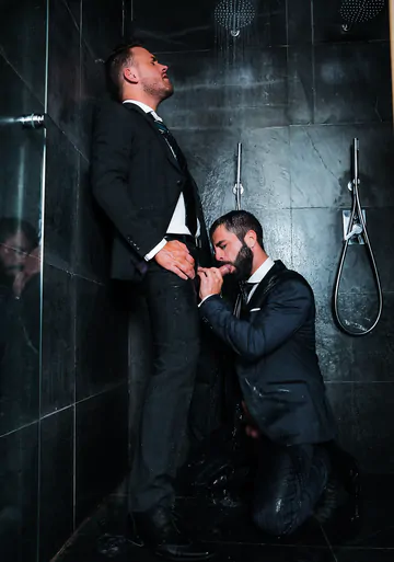Guys in suits taking a shower