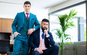 Well dressed guys having sex