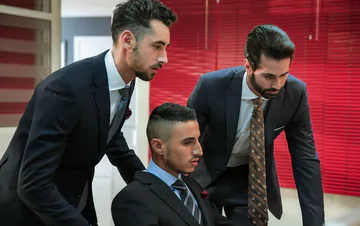 Business men having gay sex