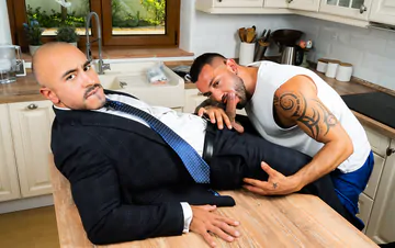 Business man in a kitchen gets fucked