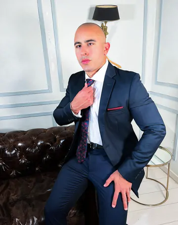 Bald muscular guy showing his goods