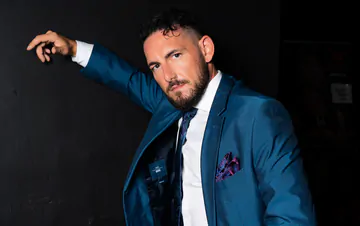 Men in blue suits getting naughty