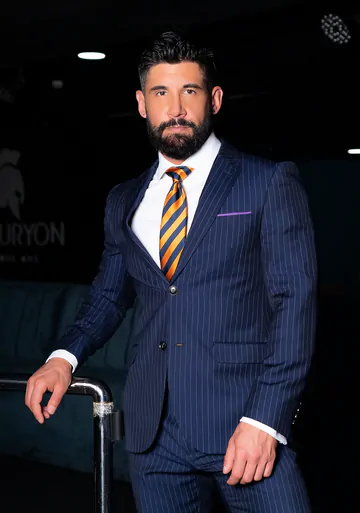 Men in blue suits getting naughty