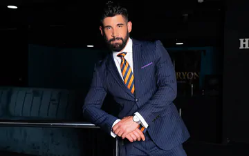 Men in blue suits getting naughty