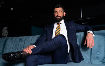 Men in blue suits getting naughty