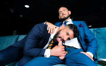 Men in blue suits getting naughty