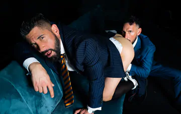 Men in blue suits getting naughty