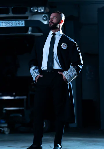 Men in a garage having gay sex