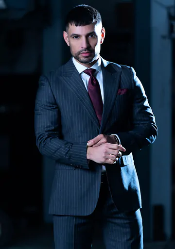 Men in a garage having gay sex