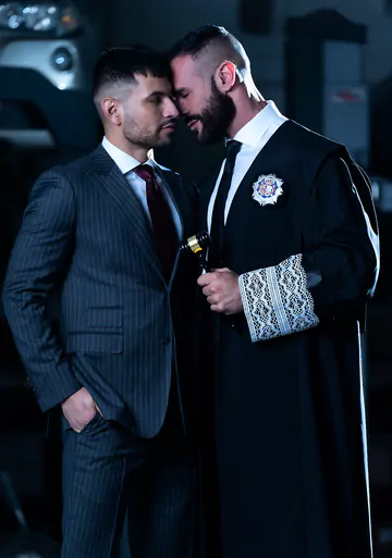 Men in a garage having gay sex