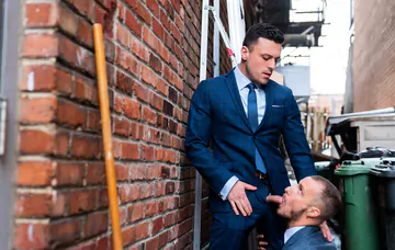 Men having sex in an alley