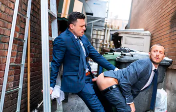 Men having sex in an alley