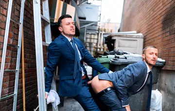 Men having sex in an alley